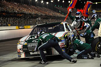 Dale Earnhardt, Jr.'s pit crew executing a pit stop