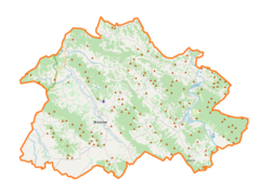 Mapa konturowa powiatu brzozowskiego, blisko centrum na dole znajduje się punkt z opisem „Humniska”