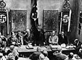 Image 5Adolf Hitler (standing) delivers a speech in February 1925. (from 1920s)