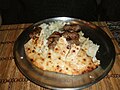 Image 31Bosnian ćevapi with onions in a somun. (from Culture of Bosnia and Herzegovina)