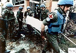 UN peacekeepers collecting bodies from Ahmići, Bosnia and Herzegovina in April 1993