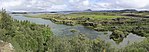 Mývatn lake, surrounded by lush vegetation