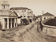 The Court-House Building on Apollo Street, Bombay (third building on left, just beyond the domed Ice House) shown in 1850.