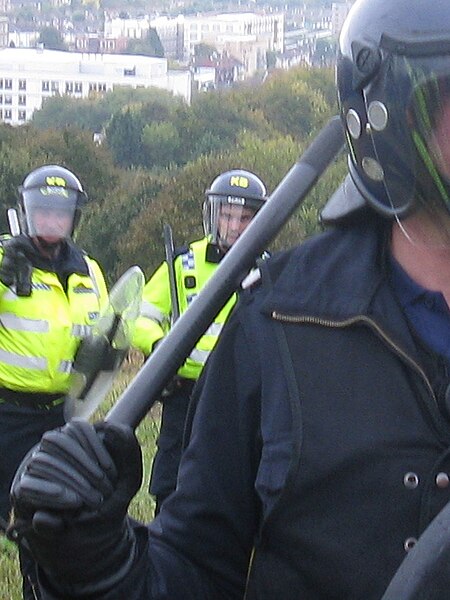 File:Baton held by officer.jpg