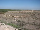 מראה הכותל הדרומי של חומת ארמון השליט בפסגת התל