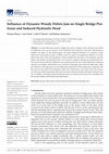 Research paper thumbnail of Influence of Dynamic Woody Debris Jam on Single Bridge Pier Scour and Induced Hydraulic Head