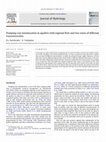 Research paper thumbnail of Pumping cost minimization in aquifers with regional flow and two zones of different transmissivities