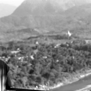 Young monk looking at panorama