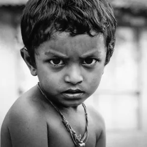 Boy with arch of eyebrow