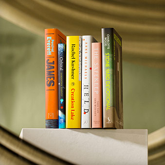 Books on a plinth on their ends