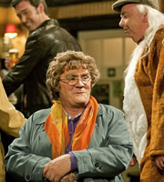 Mrs. Brown's Boys. Image shows from L to R: Agnes Brown (Brendan O'Carroll), Grandad Brown (Dermot O'Neill). Copyright: BBC / BocPix