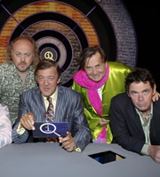 QI. Image shows from L to R: Bill Bailey, Stephen Fry, Barry Humphries, Rich Hall. Copyright: TalkbackThames