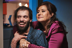 Jerk. Image shows from L to R: Tim (Tim Renkow), Tim's Mom (Lorraine Bracco)