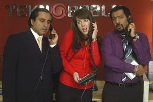 Mumbai Calling. Image shows from L to R: Kenny Gupta (Sanjeev Bhaskar), Terri Johnson (Daisy Beaumont), Dev (Nitin Ganatra). Copyright: Allan McKeown Presents