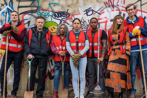 The Outlaws. Image shows from L to R: John (Darren Boyd), Frank (Christopher Walken), Myrna (Clare Perkins), Rani Rekowski (Rhianne Barreto), Christian (Gamba Cole), Gabby (Eleanor Tomlinson), Greg (Stephen Merchant)