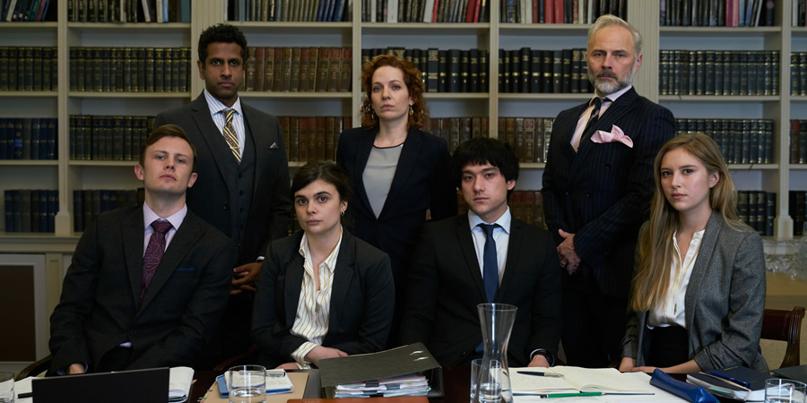 Defending The Guilty. Image shows from L to R: Liam (Hugh Coles), Ashley (Prasanna Puwanarajah), Danielle (Gwyneth Keyworth), Caroline Bratt (Katherine Parkinson), Will Packham (Will Sharpe), Miles (Mark Bonnar), Pia (Hanako Footman). Copyright: Big Talk Productions