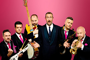 The Horne Section. Image shows left to right: Ed Sheldrake, Ben Reynolds, Will Collier, Alex Horne, Mark Brown, Joe Auckland