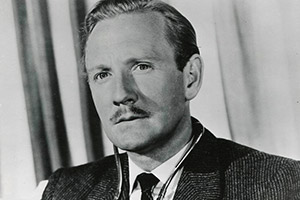 Please Turn Over. Dr. Henry Manners / 'Dr. Adam Gay' (Leslie Phillips). Copyright: STUDIOCANAL / Anglo Amalgamated