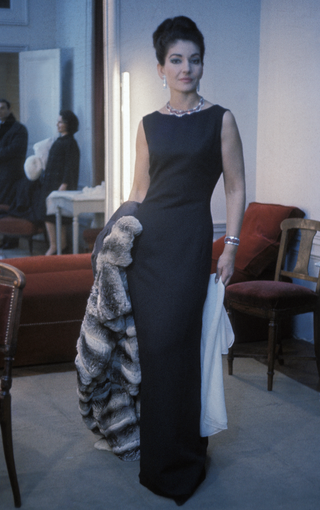 portrait of Maria Callas circa 1960 wearing a black dress.