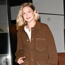 gigi hadid wearing a chocolate brown jacket