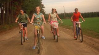 Christian Ricci, Thora Birch, Ashleigh Aston Moore and Gabby Hoffman rides bikes in 'Now and Then'