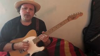 A still from Jim Oblon's Guitar World video lesson, in which the Telecaster master is teaching us how to add the fifth to your bass notes in a blues shuffle.