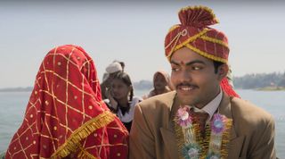 a man on a boat in laapataa ladies