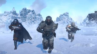 The 25 best PC games - Helldivers 2 screenshot of three Divers charging across a frozen planet