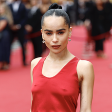 zoe kravitz wears a red column dress at the premiere of 'blink twice' 