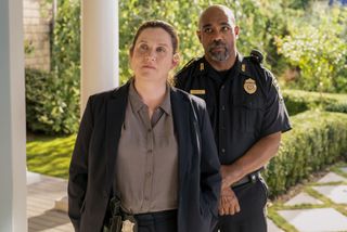 Donna Lynne Champlin as Nikki Henry, Michael Beach as Dan Carter in episode 106 of The Perfect Couple.