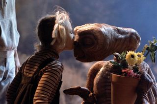 Drew Barrymore kisses E.T. on the set of 'E.T.'