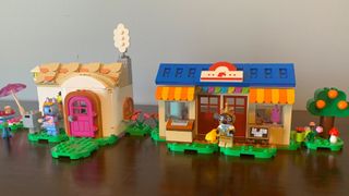 Lego Nook's Cranny & Rosie's House set on a wooden surface