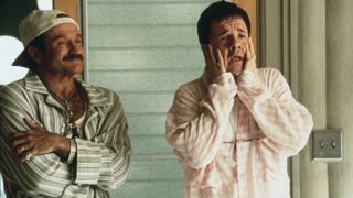 Robin Williams wears a mustache and stands next to Nathan Lane in 'The Birdcage'