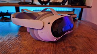 Pico 4 Ultra review image of the headset on top of a gaming desk