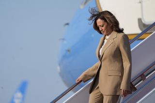 kamala harris in a brown suit