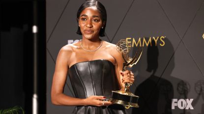 Ayo Edebiri, winner of the award for Outstanding Supporting Actress in a Comedy Series for &quot;The Bear,&quot; poses in the press room the 75th Primetime Emmy Awards at Peacock Theater in Los Angeles, CA, Monday, Jan. 15, 2024.