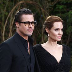 london, united kingdom may 08 brad pitt and angelina jolie attends a private reception as costumes and props from disneys maleficent are exhibited in support of great ormond street hospital at kensington palace on may 8, 2014 in london, england photo by fred duvalfilmmagic