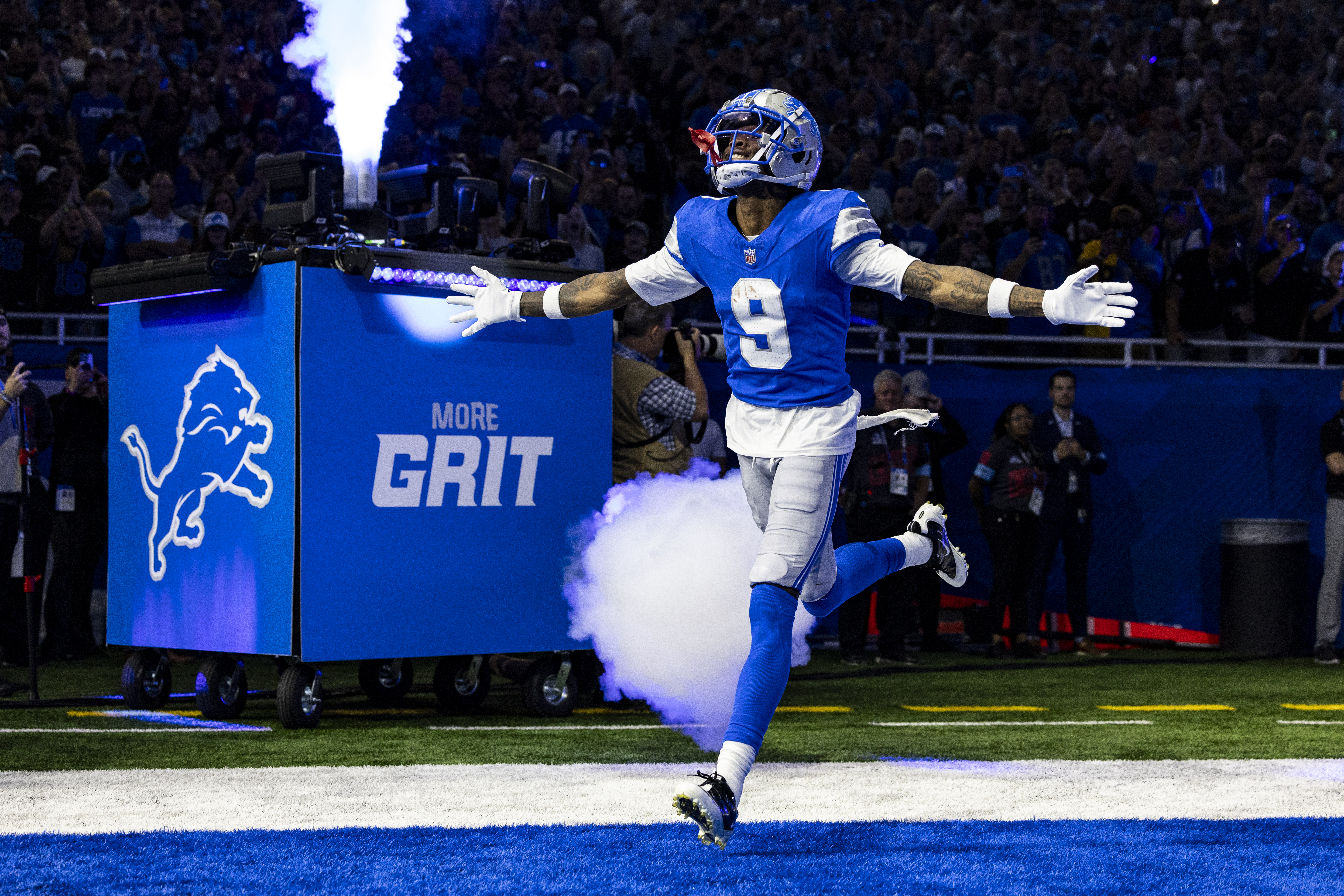 Jameson Williams #9 of the Detroit Lions runs onto the field before the game against the Tampa Bay Buccaneers at Ford Field on September 15, 2024 in Detroit, Michigan. The Buccaneers beat the Lions 20-16.