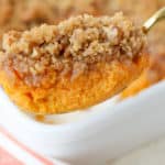 Sweet potato souffle on a large spoon