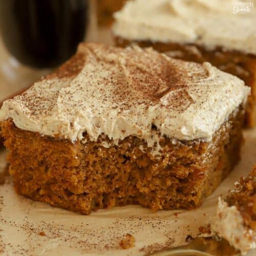 Slice of pumpkin spice latte cake next to a gold fork.