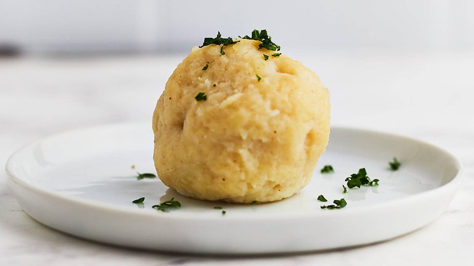 German Potato Dumpling (Kartoffelknödel) recipe by Cheerful Cook.