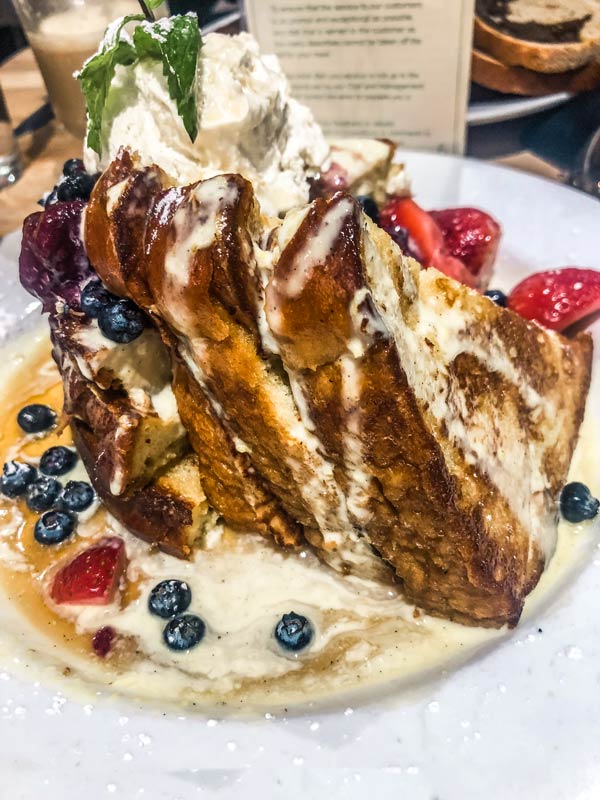 Make sure to get the Creme Brule French toast at Green Eggs Cafe during your weekend in Philadelphia