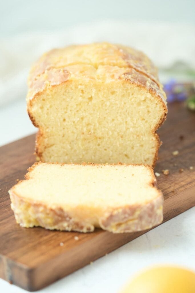 sourdough lemon cake on wooden board