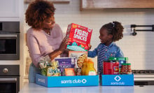 A family unloading groceries 