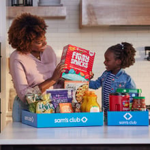 A family unloading groceries 