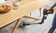 shark powerdetect cordless vacuum bending in middle to reach under table