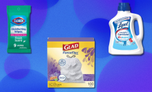 Cleaning supplies on blue and purple background