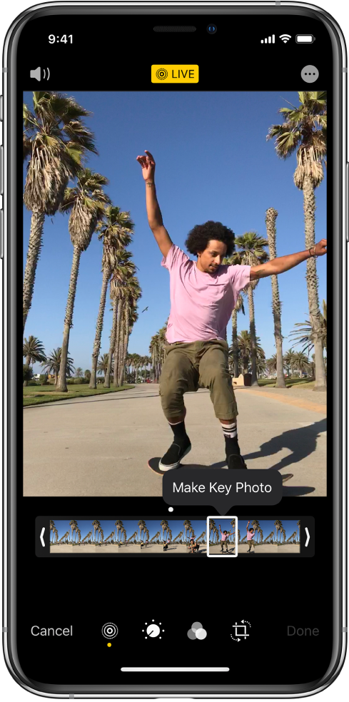 A Live Photo screen with the Live Photo in the center. The Live button is in the top middle, and the Sound button in the top left. Beneath the Live Photo is the frame viewer with the Make Key Photo button active. On either end of the frame viewer are two bars that allow you to trim the Live Photo.