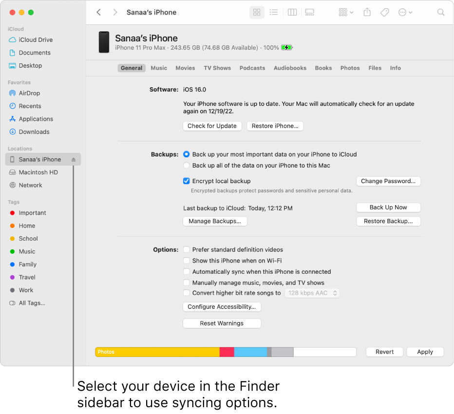 A device selected in the Finder sidebar and syncing options appearing in the window.