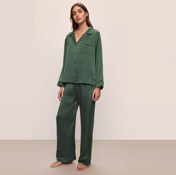 model wearing green loungewear set against a light background